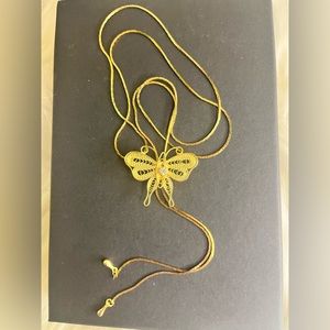 Gold butterfly lariat